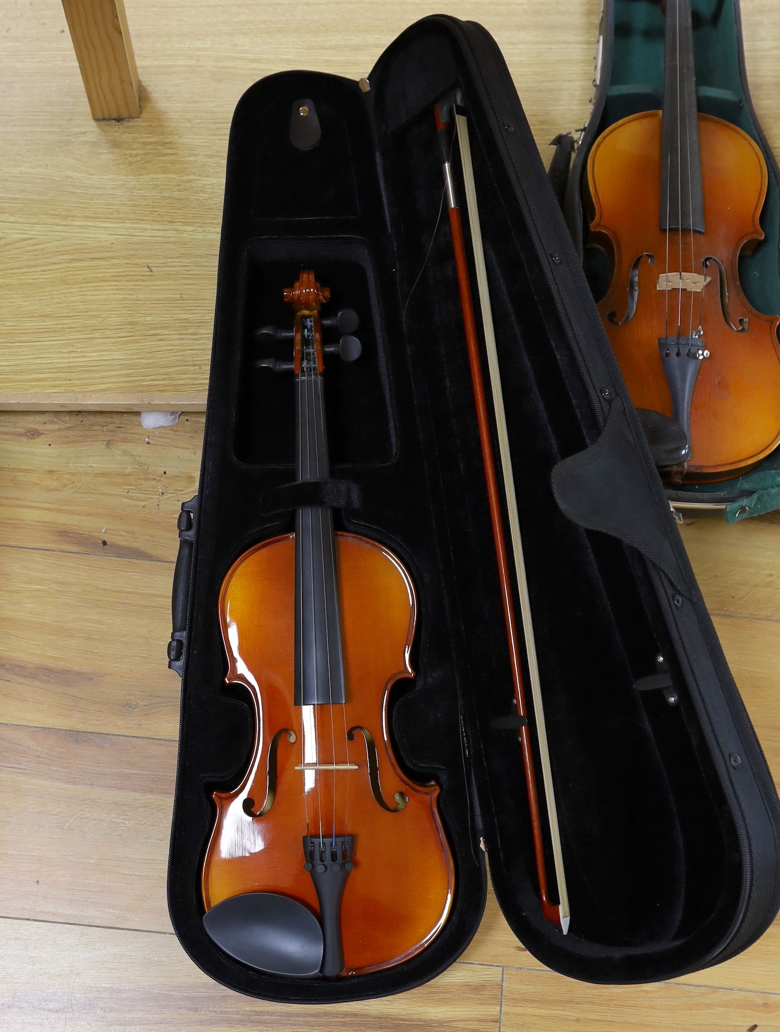 A cased early 20th century violin marked Gilks, Westminster, London and 2 modern cased Chinese violins